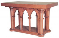 The 535, 536, 537 & 538 series altars offer elegant woodworking along with a refined design. A series of 8 pillars support a solid wood surface. Made from red oak, this handmade alter will fit in beautifully with existing furniture and can be used for services or for decor. Few altars compare. Choose from a variety of sizes and wood stains. 
Dimensions:
(#535)  39" height, 60" width, 36" depth
(#536)  39" height, 72" width, 36" depth
(#537)  39" height, 84" width, 36" depth
(#538)  39" height, 48" width, 48" depth