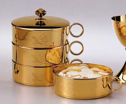 Gold stacking ciboria is hand engraved wheat and grape motifs. Diameter: 6 1/4". Capacity: 450 Hosts. Each bowl is sold separately as is the lid. 