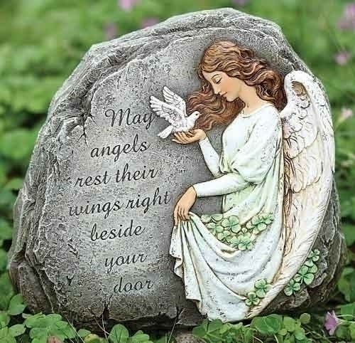 Angel and Shamrock Garden Stone. "May angels rest their wings right beside your door." Dimensions: 8.25"H 9.25"W 3"D. Resin/Stone Mix