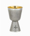 Communion Cup is  silverplate with gold lining. Finished in a straw texture. The silver cup has a black cross. The communion cup is 6"H  and holds 11oz. 

 