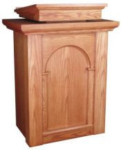 Pulpit with two inside shelves

Book rest: 24" width, 24" depth

Dimensions: 46" height, 34" width, 24" diameter

Brass lamps and symbols are available at an additional cost