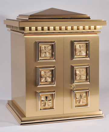 Overall Dimensions: 22.75"H x 18.75"W x 15.D,  Door Opening: 14.3/8"H, 14.25W.  Tabernacle is made of bronze, bas relief sculpted decoration of satin and high polish bronze finish.  Other finishing options available upon request.  Interior is lined with white silk and aromatic cedar. Independent action doors, vault locks and a durable oven baked finish.