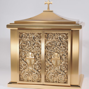 Overall Dimensions: 25"H x 21.50"W x 15.5D,  Door Opening: 14.5"H, 13.5W.  Tabernacle is made of bronze, bas relief sculpted decoration of satin and high polish bronze finish.  Other finishing options available upon request.  Interior is lined with white silk and aromatic cedar.  Independent action doors, vault locks and a durable oven baked finish.