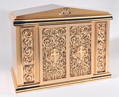 Overall Dimensisons: Height 22″, Width 28.3/8″, Depth 15.5″.  Door Opening: Height 14.50″, Width 14.50″. Tabernacle is made of bronze, bas relief sculpted decoration of satin and high polish bronze finish.  Other finishing options available upon request.  Interior is lined with white silk and aromatic cedar.  Independent action doors, vault locks and a durable oven baked finish.