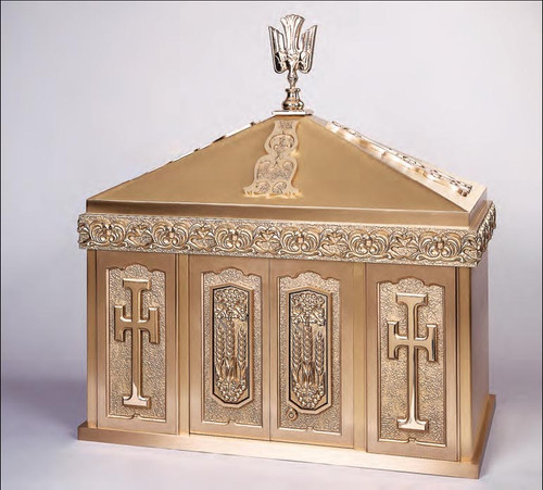 Overall Dimensions: Height 31.5″, Width 29.25″, Depth 14.75″. Height without Dome is 16.75". Tabernacle is made of statuary bronze finish, bas relief sculpted decoration.  Interior is lined with white silk and aromatic cedar. Double automatic action doors, vault locks and a durable oven baked finish.