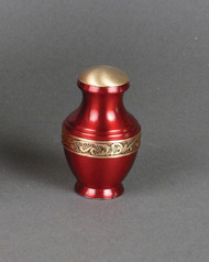 Red Brass Remembrance Urn with Gold Band. Height: 3".