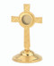 This 24 KT gold reliquary has a highly polished base. The silver plated reliquary has an oxidized finish and a highly polished base. Height: 7 1/2". Diameter: 1 5/8". Handcrafted in the USA.