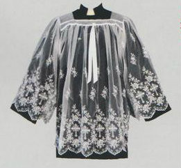 Wash and wear embroidered sheer nylon surplice, Swiss schiffli embroidered. Available in S,M,L and XL.  See sizing chart on product description page