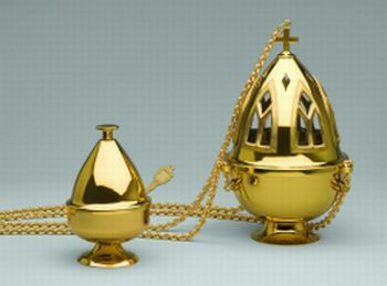 Censer and Boat. Three chain plus lid design, 9-1/2" tall, 5-3/4" diameter, replaceable inner pan to hold incense, 36" chain length, cast arch window openings. Incense boat is 5-1/2" tall by 3-1/2" diameter. Decorative spoon included.