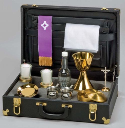 Traveling Mass Kit - 7 3/4" x 13" x 5". High quality case with portfolio for linens. Includes the following items nested in poly-foam: 6" Chalice and Paten metal all gold plated; 1 pair stainless steal cruets; 1 pair votive glass candlesticks; 1 16 oz. wine decanter; 1 metal host box; 1 standing crucifix; Chalices are all metal construction, all gold plated. Includeds priest's stole and altar linen. The chalice cups are silver plated before they are gold plated for durable finish.