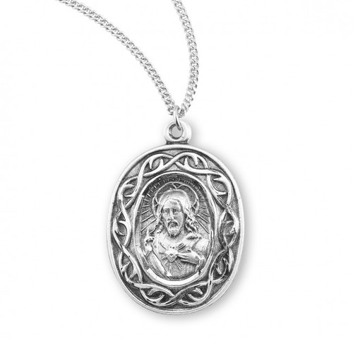 .925 Sterling Silver "Crown of Thorns" Scapular Medal. Dimensions: 0.9" x 0.7" (24mm x 17mm). Comes with a genuine rhodium plated 18" curb chain in a deluxe velour gift box.
