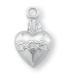 1/2" Sacred Heart on a heart shaped Medal. A 18" Rhodium Plated Curb Chain is Included with a Deluxe Velour Gift Box.