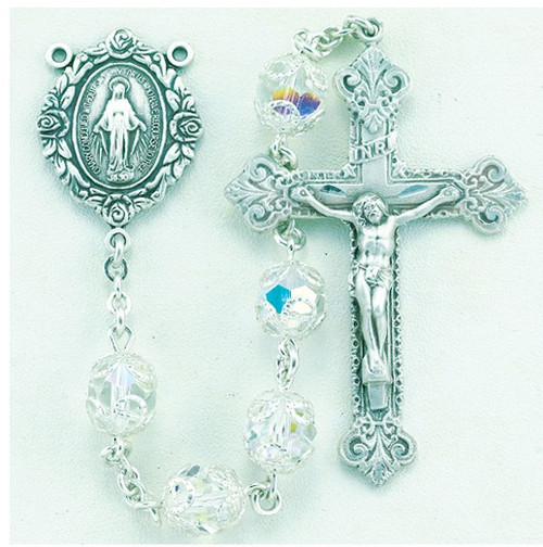 8mm Double Capped Crystal Swarovski Beads. All Sterling Silver Findings with Sterling Silver Filigree Caps, Sterling Silver Flower Miraculous Center and Fancy Baroque with 2-1/8" Sterling Crucifix. Deluxe Velour Gift Box Included. Made in the USA of solid sterling pins, chain, beads, centers, and crucifixes. 