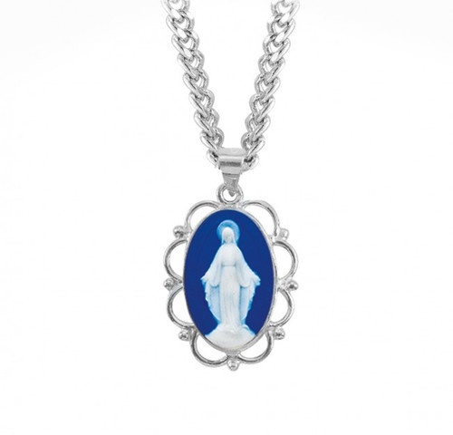 Sterling Silver Cameo Miraculous Medal made in Italy of bas-relief blue and white Capodimonte porcelain. Encased in a 1" sterling silver Italian filigree beaded frame with a bale for an 18" Rhodium plated curb chain in a deluxe velour gift box.