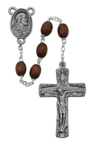 Pewter Brown Wood Bead Trinity Rosary.  Rosary has a Sacred Heart of Jesus centerpiece. Rosary comes in a  gift box. 