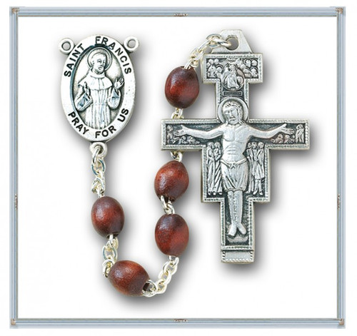Saint Francis 7 Decade "Franciscan Crown" Rosary ~ 6x9mm Franciscan 7 Decade Polished Brown Oval Boxwood Beads. Sterling Silver St. Francis Center and 1-5/8" Sterling Silver San Damiano Crucifix with Rhodium Plated Brass Findings. Deluxe Velour Gift Box Included.