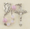 6mm Pink Opal Swarovski Crystal Beads with 8mm Pink Venetian Rosebud Our Father Beads. Centerpeice is a sterling silver St. Agatha. Crucifix measures 1-3/4".  St Agatha Rosary comes in a deluxe velour gift box. Made in the USA