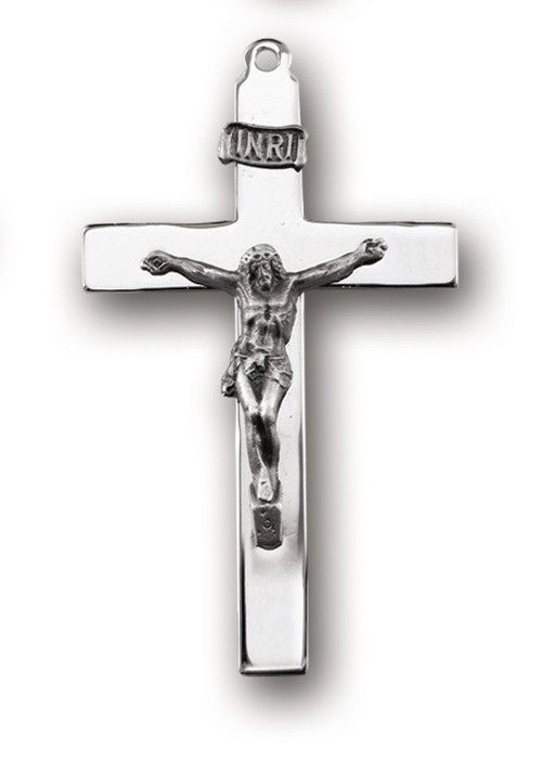 Sterling Silver Latin style crucifix pendant.  Solid .925 Sterling silver.  Dimensions: 2.2" x 1.3" (57mm x 32mm).  Weight of medal: 5.8 Grams.  Latin style crucifix comes on a 24" genuine rhodium plated endless curb chain.  Made in USA.  Deluxe velvet gift box.