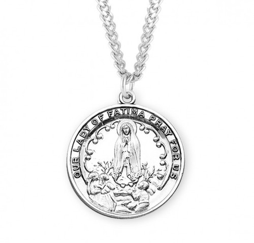 1-1/16" Sterling Silver Our Lady of Fatima Medal. A 24" rhodium plated curb chain is included. Deluxe Velour Gift Box. Made in the USA. 