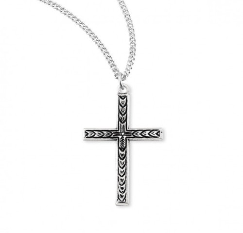 15/16" Sterling Silver Engraved Leaf Design Cross. Leaf design cross comes on an 18" genuine rhodium plated chain in a deluxe velour gift box. Dimensions: 0.9" x 0.6" (24mm x 15mm). Made in the USA