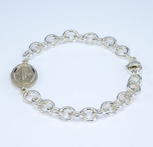 Solid Sterling Silver Heavy Link Bracelet with 1" Sterling Silver Miraculous Medal Connector. Comes in a deluxe velour gift box. Made in the USA.