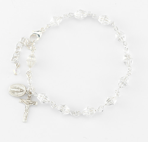 All Sterling 6mm Sterling Silver Bicone Corrugated Beads with Sterling Silver Miraculous Medal and Crucifix made with all Sterling Findings. Rosary Bracelet comes in a deluxe velour gift box. Made in the USA.