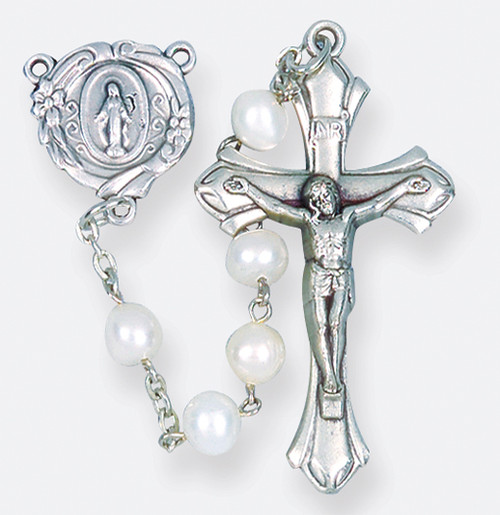 18" Genuine white fresh water pearl premium handcrafted rosary with deluxe zinc crucifix and center. Comes in a deluxe velvet gift box.