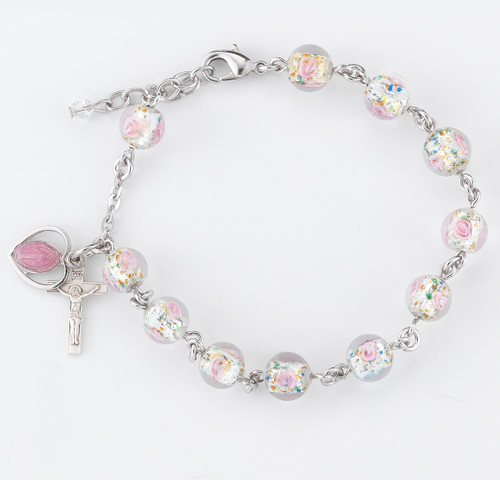 8mm Rose Embedded Murano Glass Beads and Pink Enameled Sterling Silver Miraculous Medal and Crucifix. This bracelet is 7 ½” long with a 2” extender. Choose from: 
BX: Solid Brass links with Pewter Miraculous Medal and Crucifix; or
BR: Rhodium Plated Brass links with Sterling Silver Miraculous Medal and Sterling Silver Crucifix; or
B: All Sterling Silver Links with Sterling Silver Miraculous Medal and Sterling Silver Crucifix.
Bracelet comes with deluxe velour gift box. Made in the USA. 