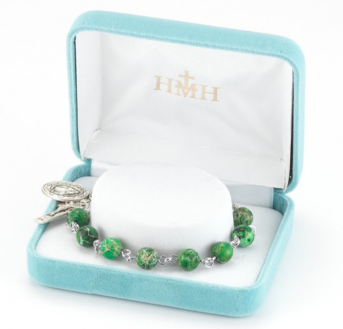Imperial Jade  ~ 8mm Rosary bracelet with round genuine stone beads. Sterling silver miraculous medal and crucifix with all sterling silver findings. Comes with a deluxe velour gift box. Made in the USA.