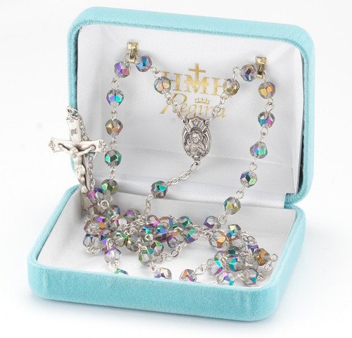 6mm Metallic multicolor vitriol helix crystal beads with sterling silver sacred heart center and exclusive design crucifix. Rhodium plated brass wires and chain. Comes with a deluxe velour gift box. Made in the USA