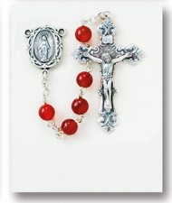 Round Genuine Agate Rosary - Rosary with 6mm Round Genuine Agate Beads. Sterling Silver Miraculous Center and 2-15/16" Sterling Silver Crucifix with Rhodium Plated Findings. Comes with a deluxe velour gift box. Made in the USA.