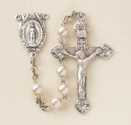 Rosary with 5mm double capped Imitation Pearl Beads. Sterling silver Miraculous Center and 1-11/16" sterling silver Crucifix. Rhodium plated brass findings. Comes with a deluxe velour gift box. Made in the USA.