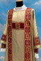 Dalmatic 485 ~ in Lame oro fabric (40% polyester, 35% wool, 25% gold thread) with banding in front and back with inside stole. Color choices: red, white, green, rose, and purple. Measurements: 49" long, 61" wide. 
These items are imported from Europe. Please supply your Intitution’s Federal ID # as to avoid an import tax. 
Please allow 3-4 weeks for delivery if item is not in stock
