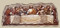 The Last Supper Wall Plaque with Cut Out Edges.  Dimensions: 5"H x 12.25"W x 0.40D. Resin and stone mix. 