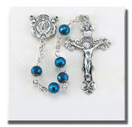 Blue Zircon Rosary- 6mm Zircon Multi Faceted Tin Cut Crystal Beads with Sterling Silver Miraculous Center and 1 3/4" Sterling Crucifix. Comes with a Deluxe Velour Gift Box. Made in the USA.