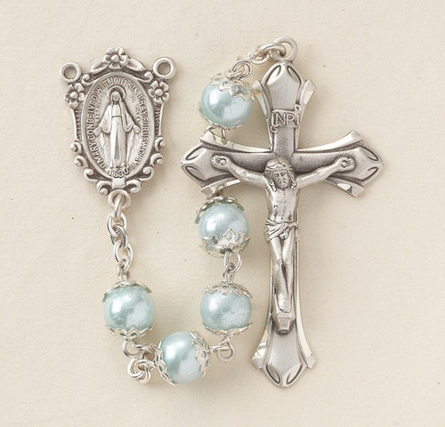 Sterling Silver rosary made with 8mm light blue imitation pearl double capped beads. Solid brass findings, pins and chain with genuine rhodium plating to prevent tarnishing. Exclusive designed sterling silver Miraculous Medal centerpiece and sterling silver 1-7/8”crucifix. Deluxe Velour Gift Box Included. Made in the USA.