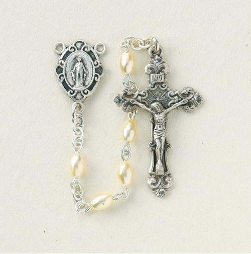 Sterling Silver rosary made with 3x5mm oval faux pearl beads. Solid brass findings, pins and chain with genuine rhodium plating to prevent tarnishing. Exclusive designed sterling silver Miraculous Medal centerpiece and sterling silver 1-5/16”crucifix. Comes with a deluxe velour gift box. Made in the USA.