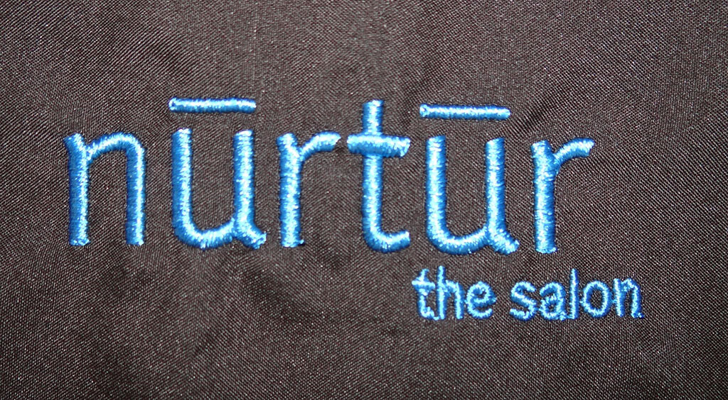 Nurtur Aveda salon loves Custom Salon Capes!