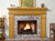 The Bridgeport custom fireplace mantel shown with brick facing.