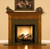 The Hanceville fireplace mantel is shown here with a granite facing kit.