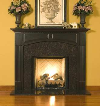 The elegant Lennox Custom Fireplace mantel is shown here with a granite facing kit.