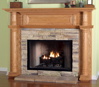 The Chapman fireplace mantel  has a wood framed top panel.