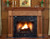 The Princeville custom fireplace mantel has smooth column legs that sit on a square base