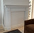 Not every mantel ends up around a fireplace. This Leesburg mantel is still the focal point of this room.