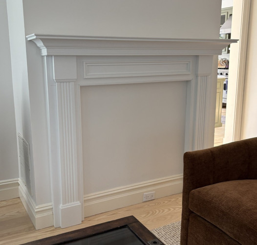 Not every mantel ends up around a fireplace. This Leesburg mantel is still the focal point of this room.
