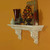 The Athens mantel shelf, with solid wood acathus leaf corbels.  Glaze finish shown