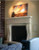 The Avant is a contemporary stone mantel with a few optional accessories