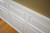 Custom two-tiered Raised Panel Wainscoting recently installed!