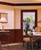 New England Classic Rustic distressed, hand-scraped maple door and window trim includes three lengths of two-peice trim (a cap and a rail.)  Cut on site to fit around your doors and windows to integrate perfectly with your wainscot paneling project.
