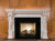 Marble mantel shown with a granite facing kit.